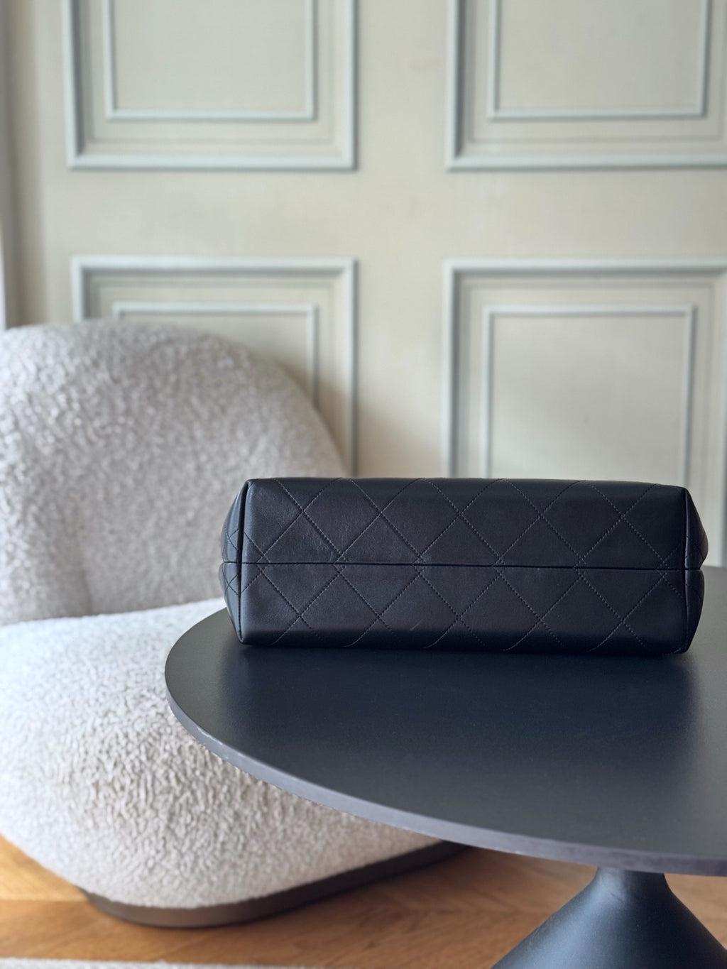 Chanel dark quilted leather shoulder bag with rounded top and smooth handles