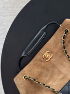 Chanel two-tone shoulder bag with CC logo, tan panel and dark leather side pocket