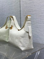 Dior hobo bag in white quilted leather with gold hardware and top strap