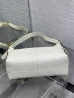 Dior hobo bag in white quilted leather, curved handles and gold hardware