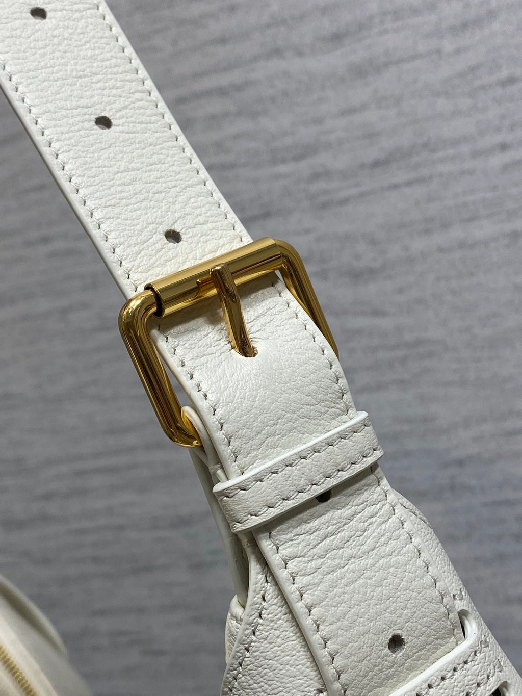 Dior bag white leather strap with gold-tone buckle hardware