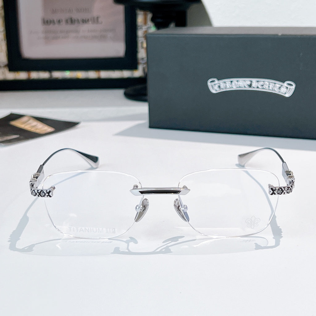 Silver eyeglasses with clear lenses and patterned temple tips