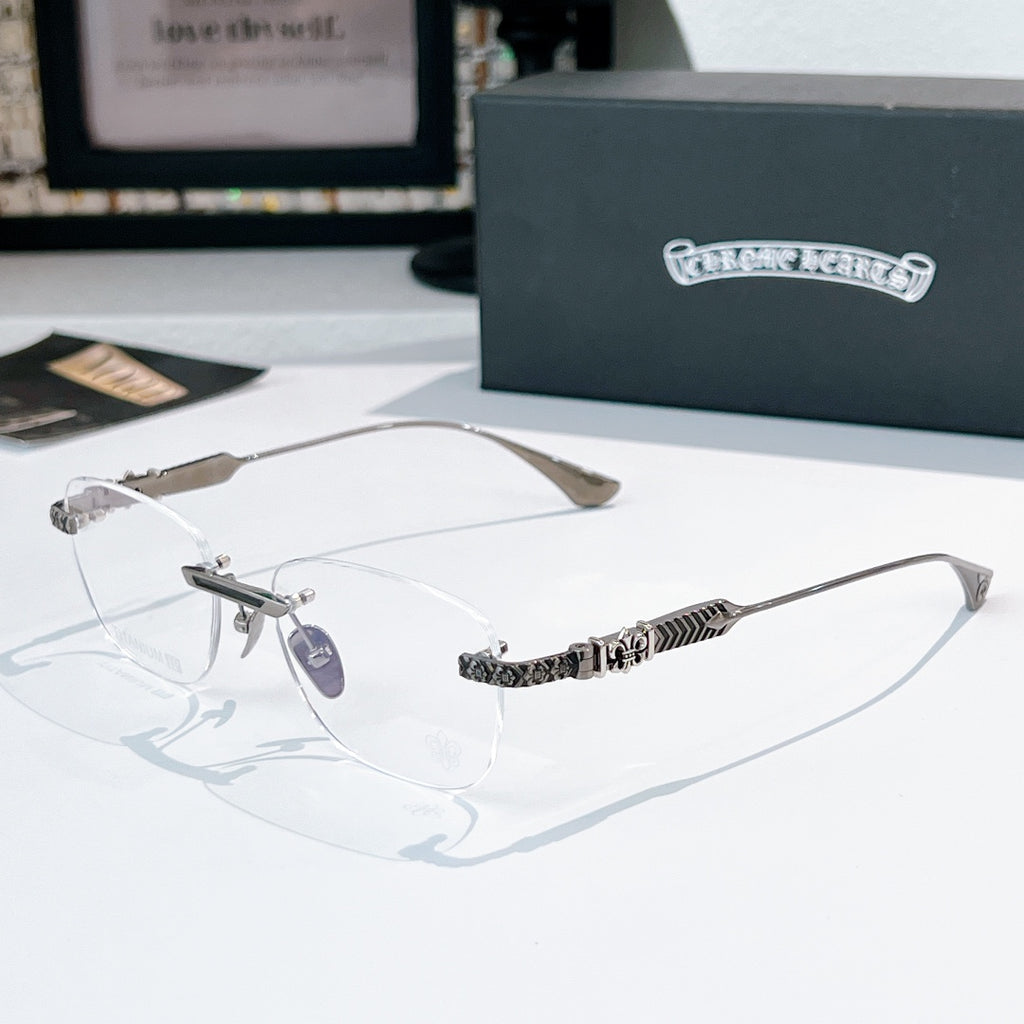 Clear-lensed eyeglasses with silver frame and patterned black temple arms