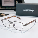 Eyeglasses with silver rectangular frame and brown patterned temples.