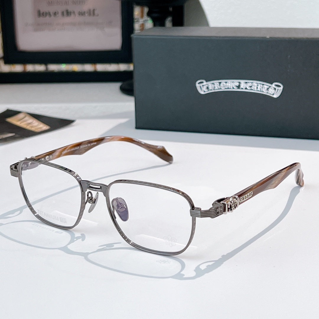 Eyeglasses with silver rectangular frame and brown patterned temples.