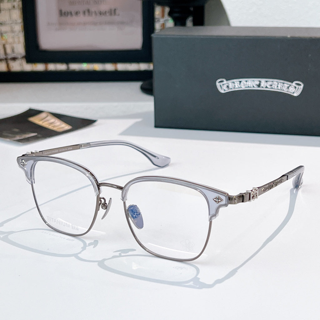 Round eyeglasses with silver metal frame, blue bridge accent, clear lenses