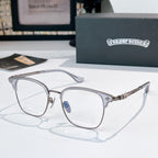 Round eyeglasses with silver metal frame, blue bridge accent, clear lenses