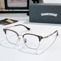 Round eyeglasses with silver metal frame and dark temples, clear lenses