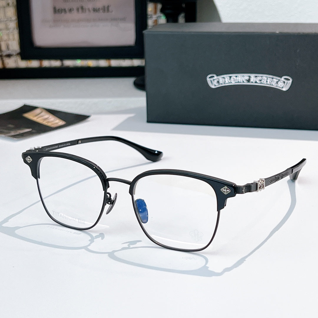 Round eyeglasses with black front frame, silver temple detail, clear lenses