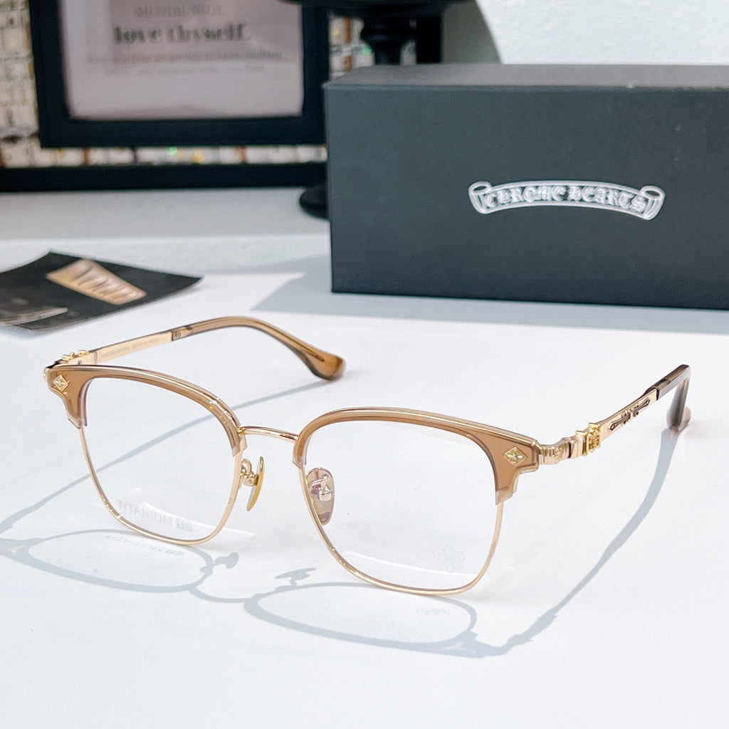 Round eyeglasses with gold metal frame, black temple tips, clear lenses