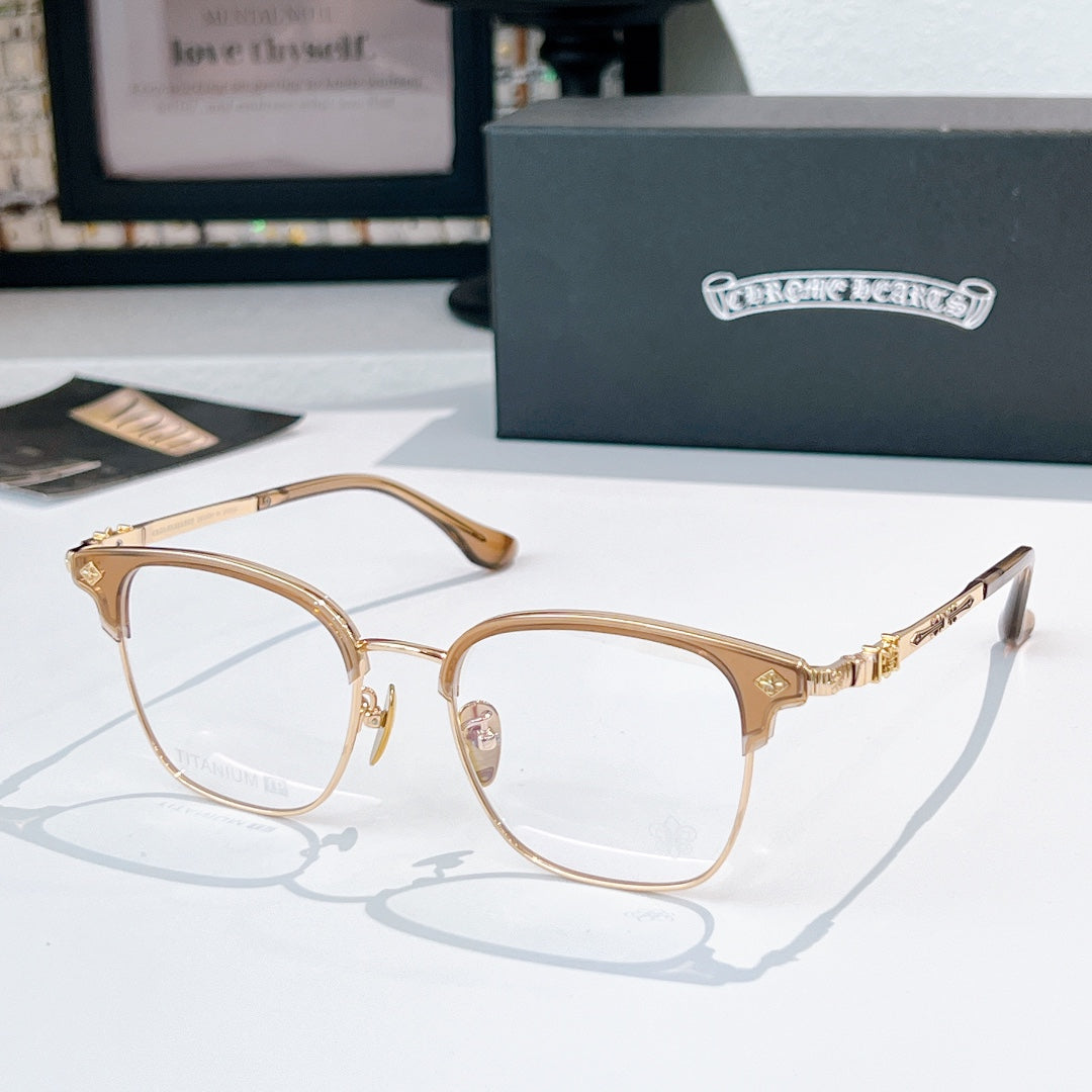 Round eyeglasses with gold metal frame, black temple tips, clear lenses
