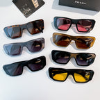 Assorted Prada sunglasses with tinted lenses in several frame colors