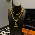 Gold layered chain necklace with cross charm pendant