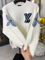 Off-white knit sweater with navy LV logo and blue sleeve graphic