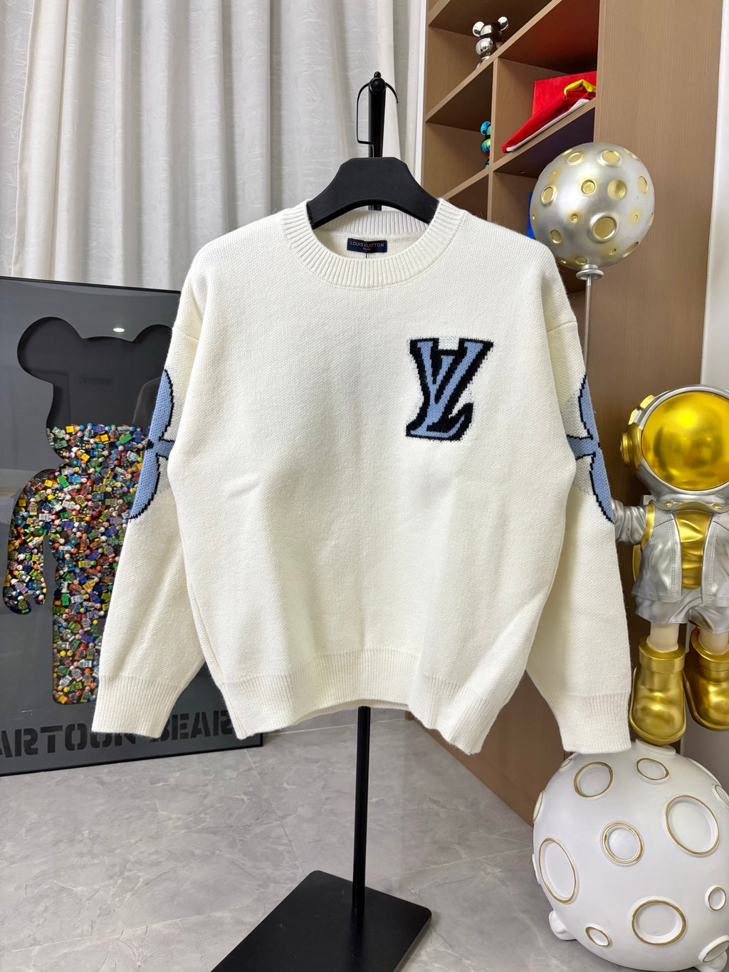 Louis Vuitton off-white knit sweater with navy LV logo patch