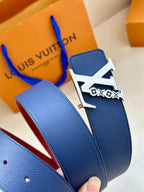 Louis Vuitton belt set with two blue straps and large silver LV buckle