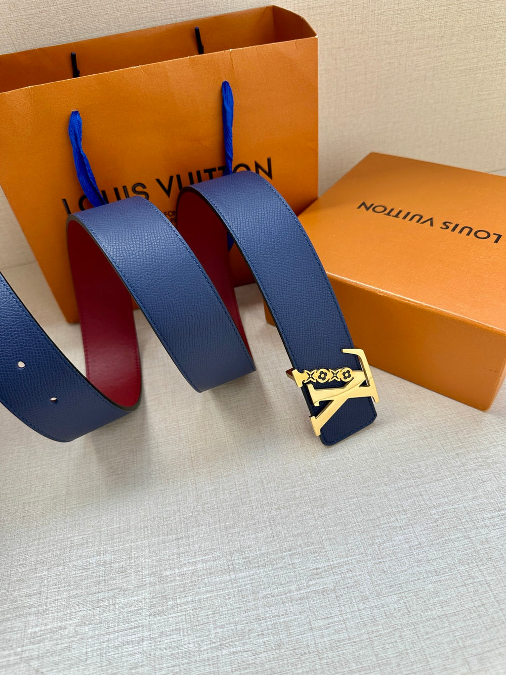 Louis Vuitton belt straps in navy blue with LV metal buckle and small tag