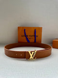 Louis Vuitton leather belt, tan/brown with embossed pattern and gold-tone LV buckle