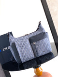 Dior men’s bag in light blue and navy with woven monogram and shoulder strap
