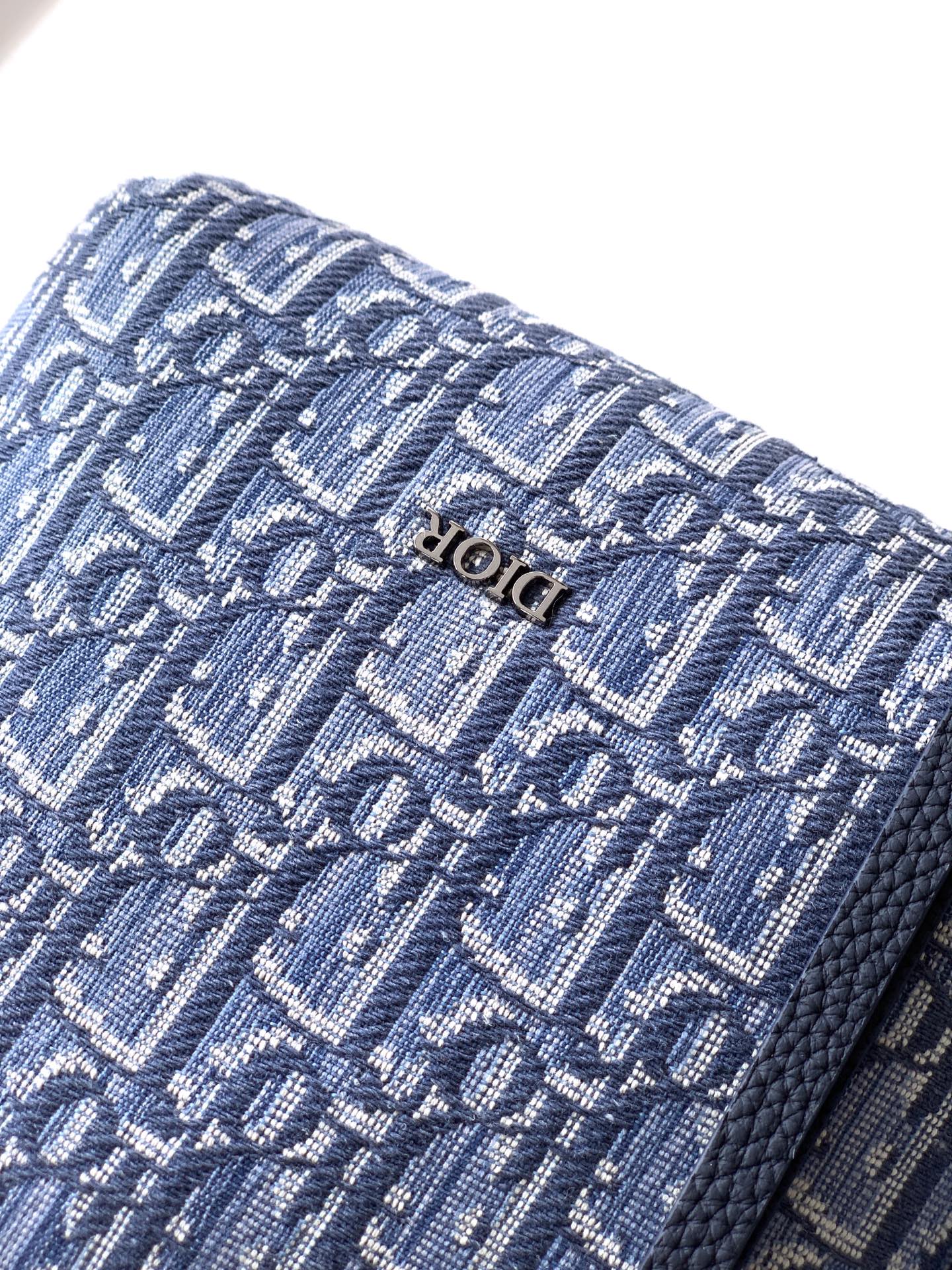 Dior monogram bag in light blue woven texture with dark blue leather trim