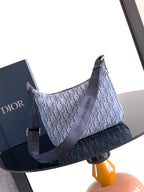 Men's Dior crossbody bag with long strap, blue monogram print, gold-tone hardware