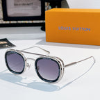 Louis Vuitton round sunglasses, silver frames with dark purple lenses.