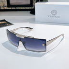 Versace sunglasses with dark blue tinted lenses and dark frames