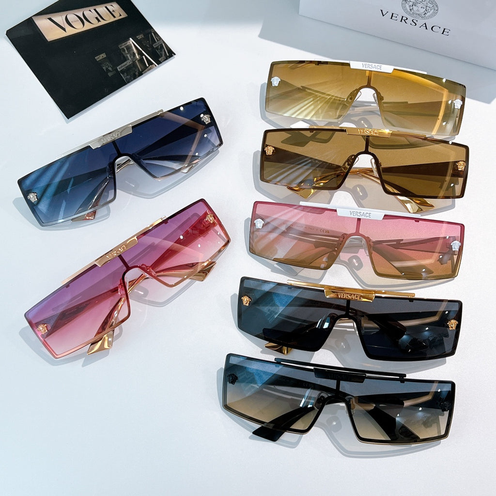 Versace sunglasses assortment with blue, gold, pink, and black lenses