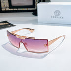 Versace sunglasses with rose tinted lenses and light pink frames