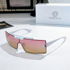 Versace sunglasses with pink tinted lenses and light frames
