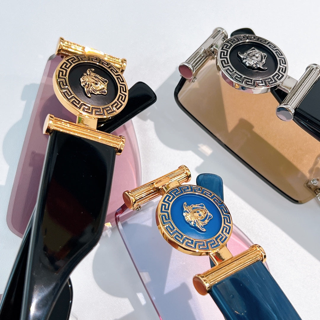 Versace sunglasses temple close-up with gold detailing and colored emblem panels