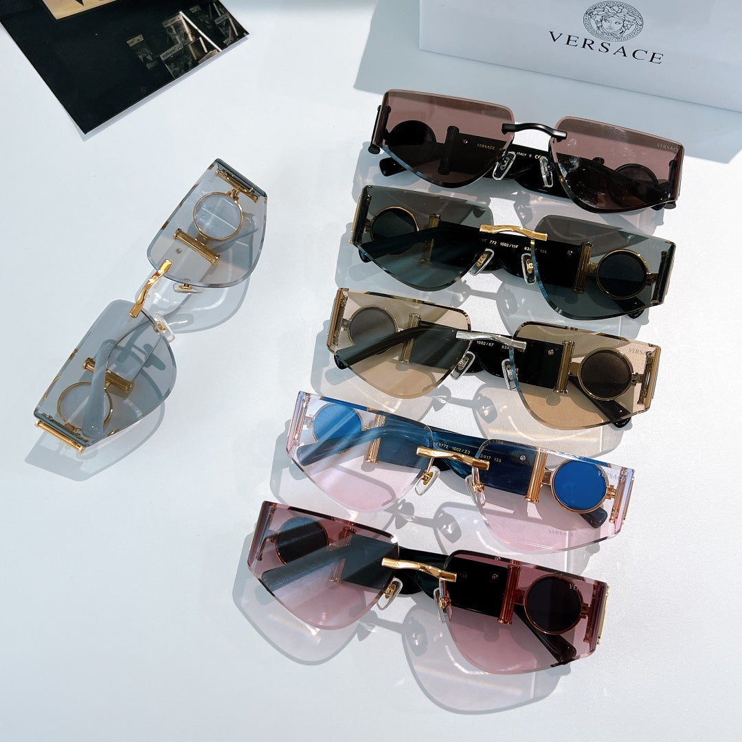 Versace sunglasses assortment with mixed frames and lens colors, shown with branded temple details