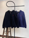 Zip-up hoodies, black and navy, with red polo logo and drawstring hood