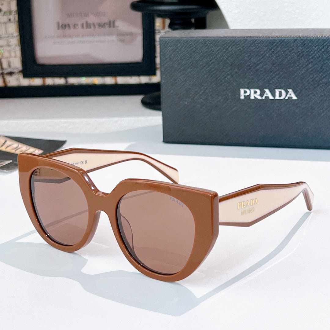 Prada sunglasses with brown frames and rose-tinted lenses.