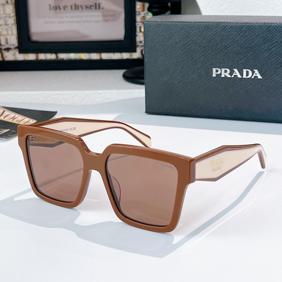 Brown tortoise square sunglasses with tinted lenses and Prada logo on temple.