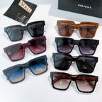 Assorted Prada square sunglasses with mixed frames and tinted lenses.