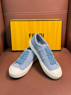 Fendi unisex light-blue slip-on sneakers, heel view with white midsole and Fendi tab