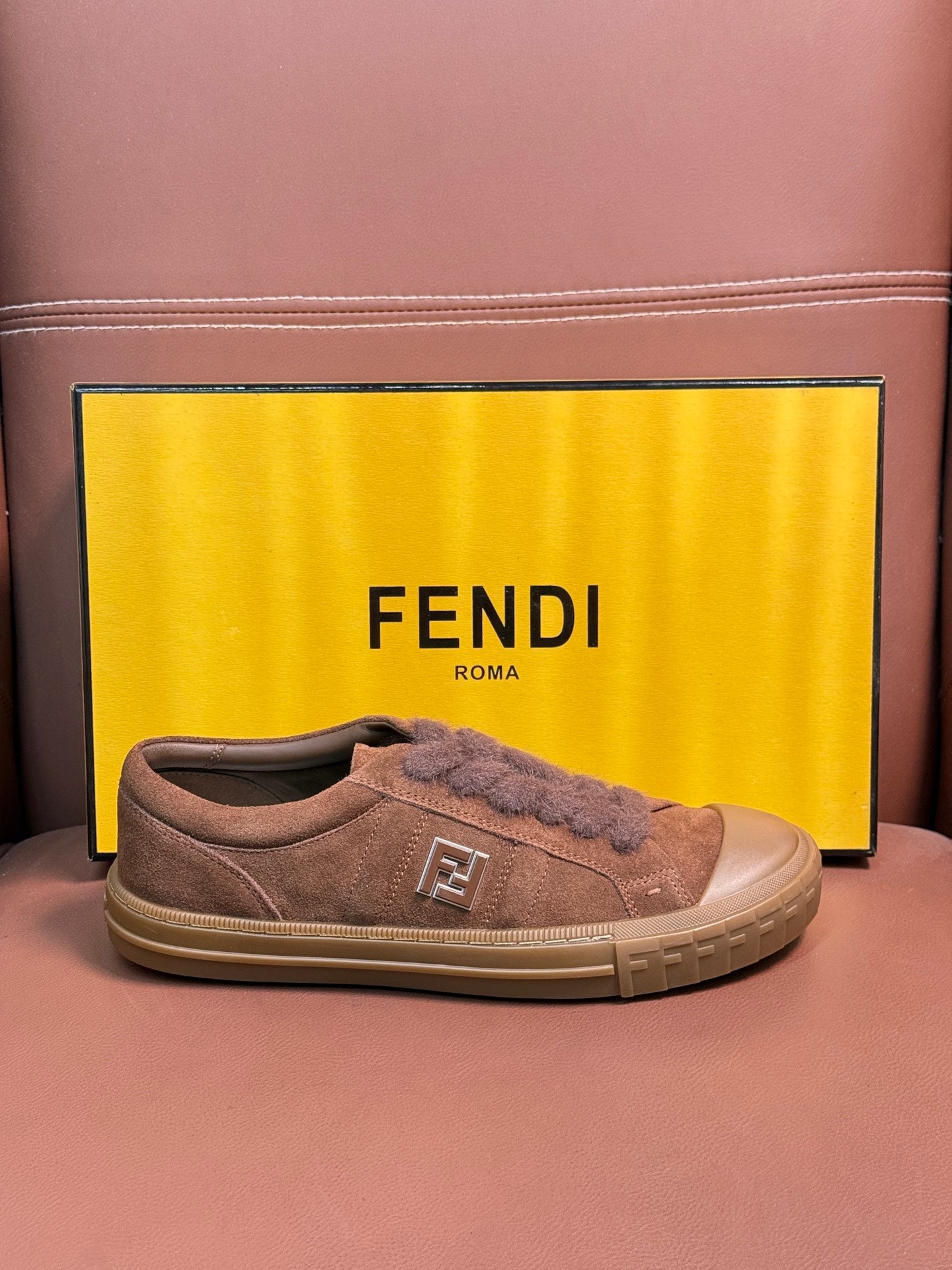 Fendi unisex suede sneakers, front low angle with lace-up and logo emblem