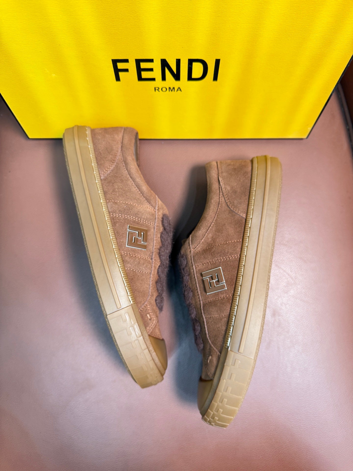 Fendi unisex suede sneakers, side profile with FF logo patches and textured sole