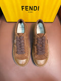 Fendi unisex suede sneakers with lace-up front and embossed logo at toe