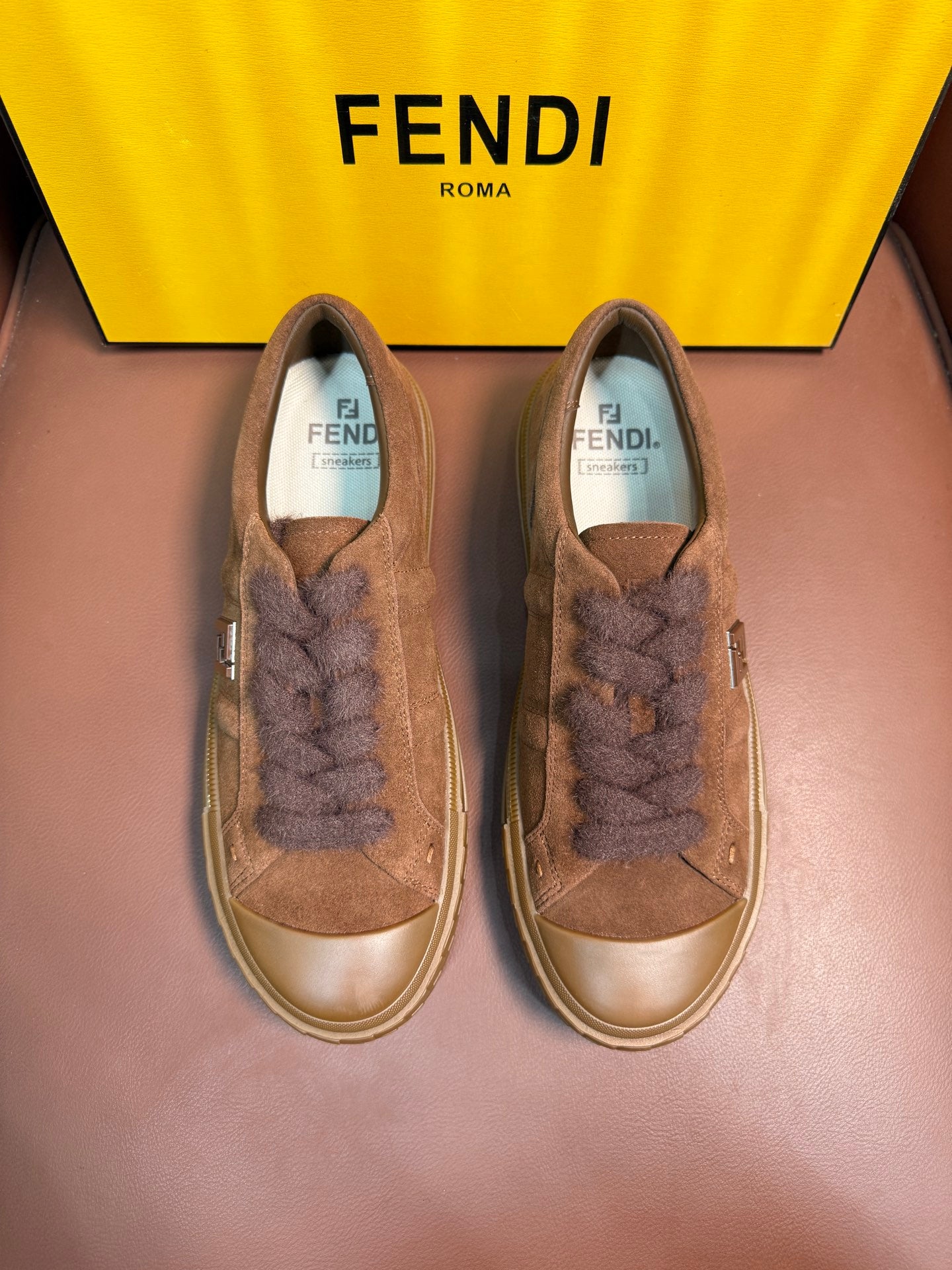 Fendi unisex suede sneakers with lace-up front and embossed logo at toe