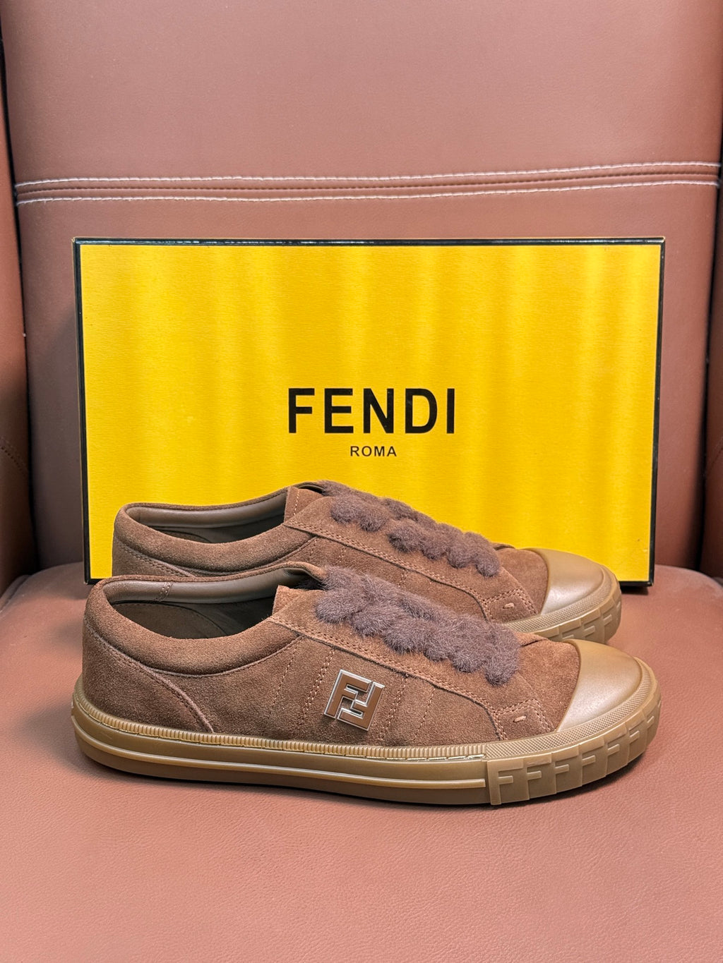 Fendi unisex suede sneakers, front view with lace-up and FF logo on tongue