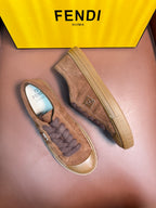 Fendi unisex suede sneakers, side view with lace-up detail and rubber sole