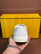 White Fendi unisex sneakers, heel close-up with Fendi logo on the back tab