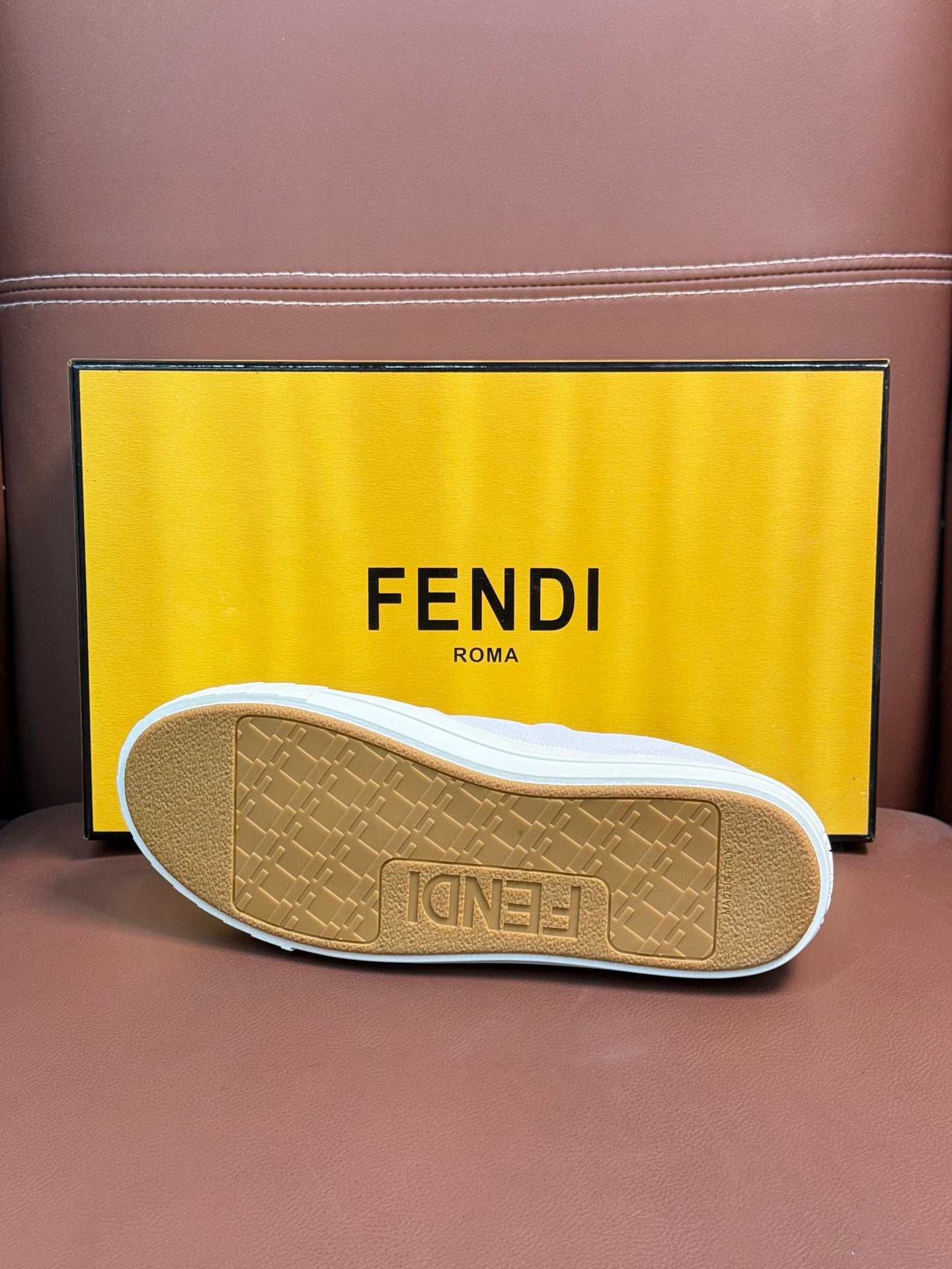 Tan Fendi unisex sneaker outsole, textured tread with logo-marked heel edge