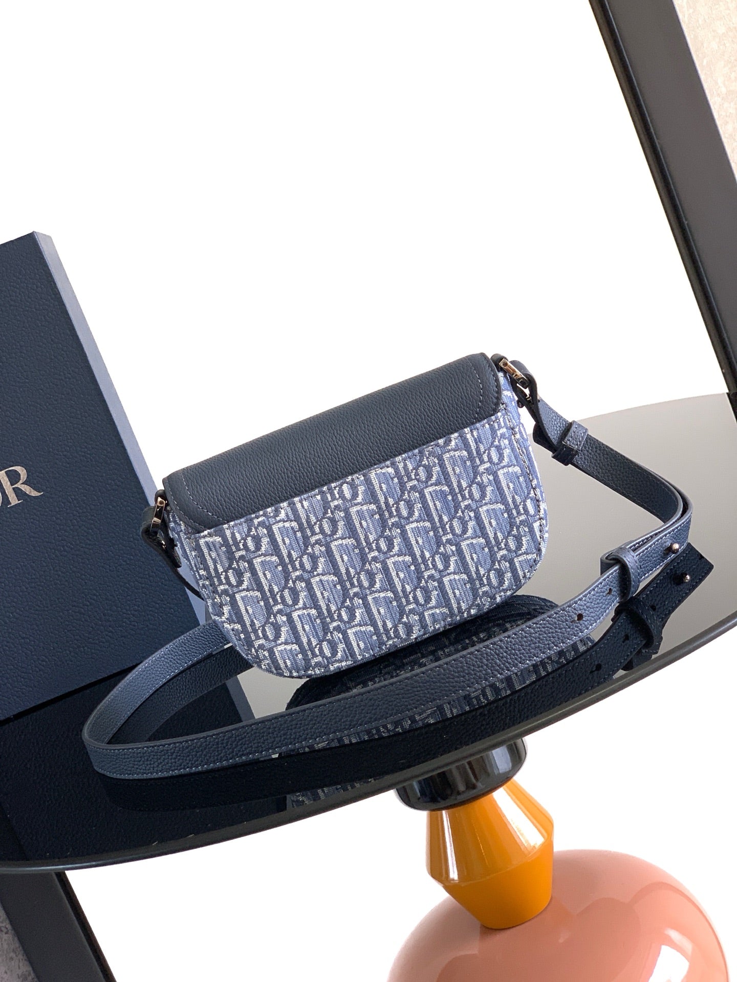 Dior crossbody bag with navy strap and blue monogram front flap