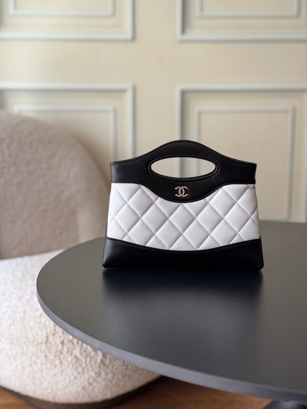 Chanel quilted mini handbag, black and white with top handle and CC logo