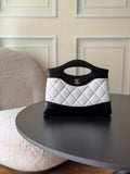 Chanel quilted mini handbag, black and white with top handle and CC logo