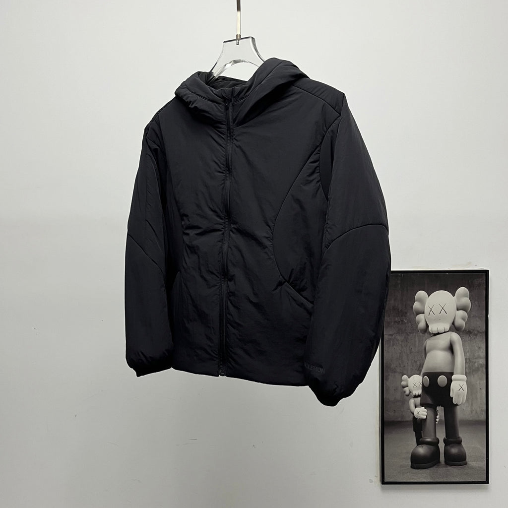 Black hooded puffer jacket, front view with zipper