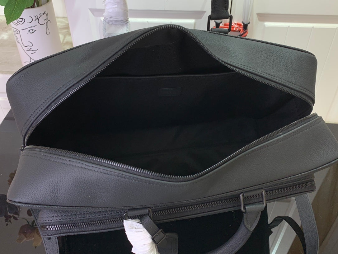 Leather briefcase bag open top, dark lining and zip closure, shoulder strap